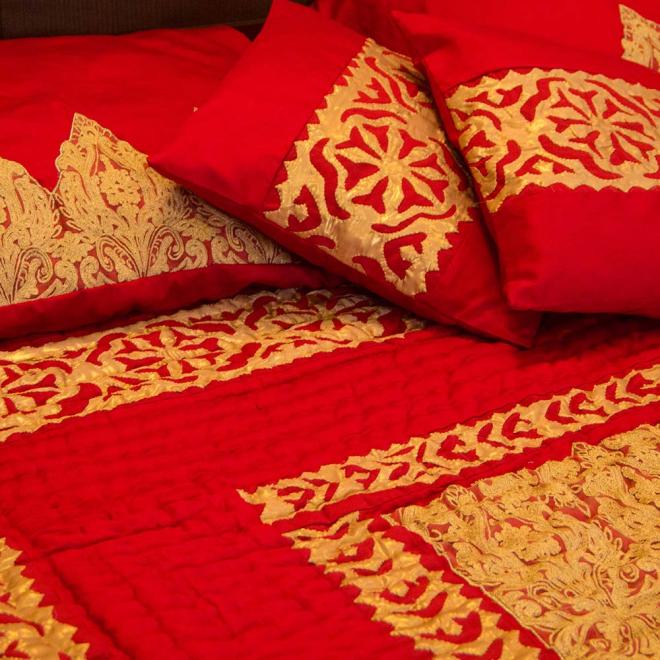 Red Bridal Quilt with lace and gold rilli