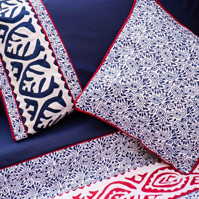 Navy quilt cover with red rilli