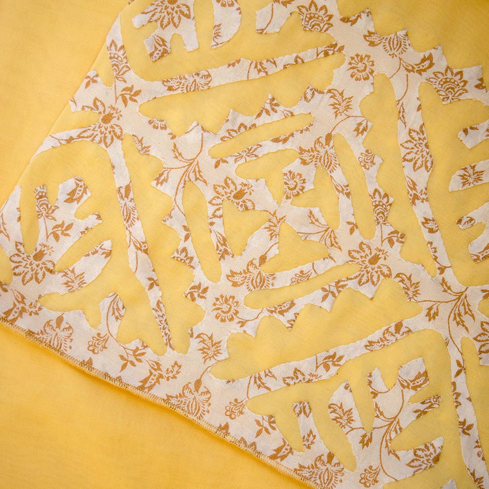 Yellow with cream screen print rilli on Swiss Voile