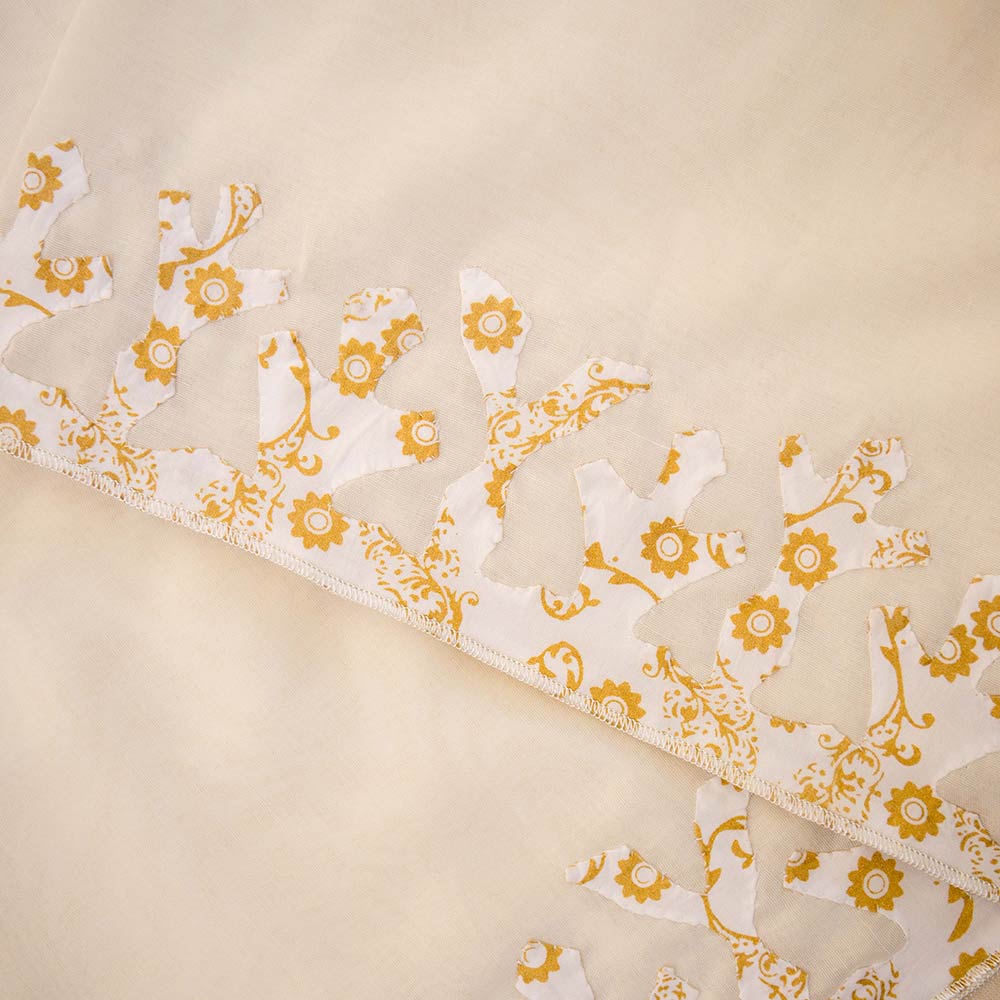 Cream with cream screen print rilli on Swiss Voile