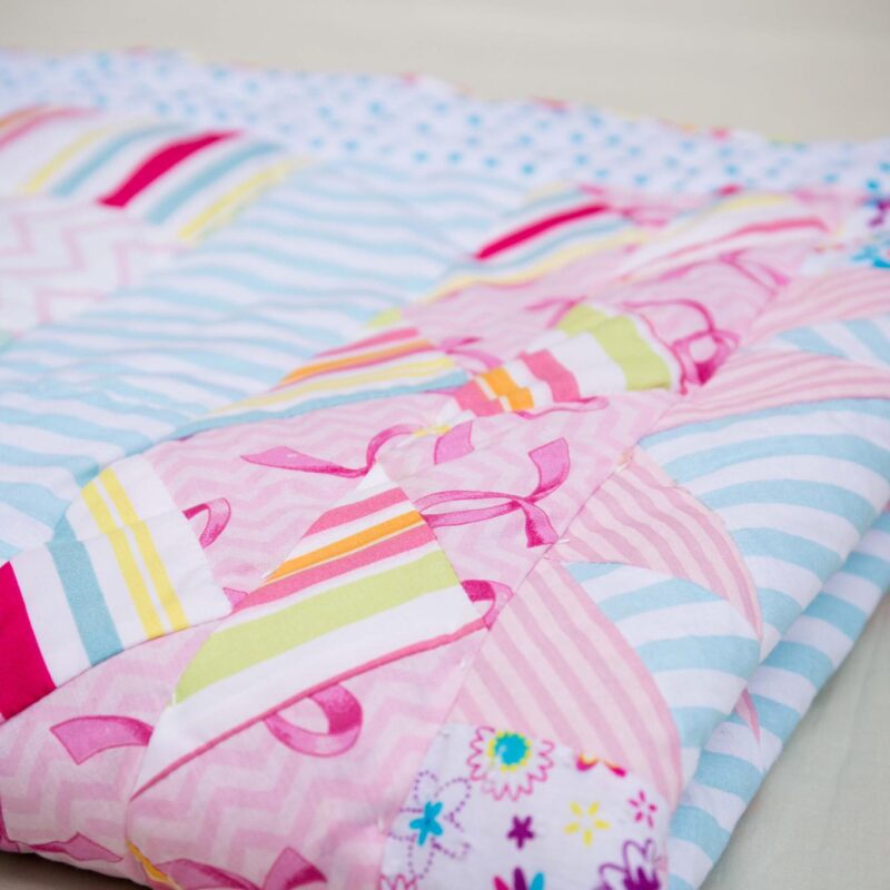Turquoise and Pink Patchwork Quilt