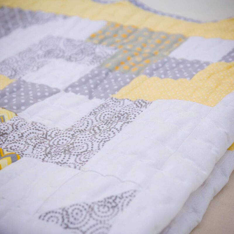 Grey and Yellow Patchwork Quilt